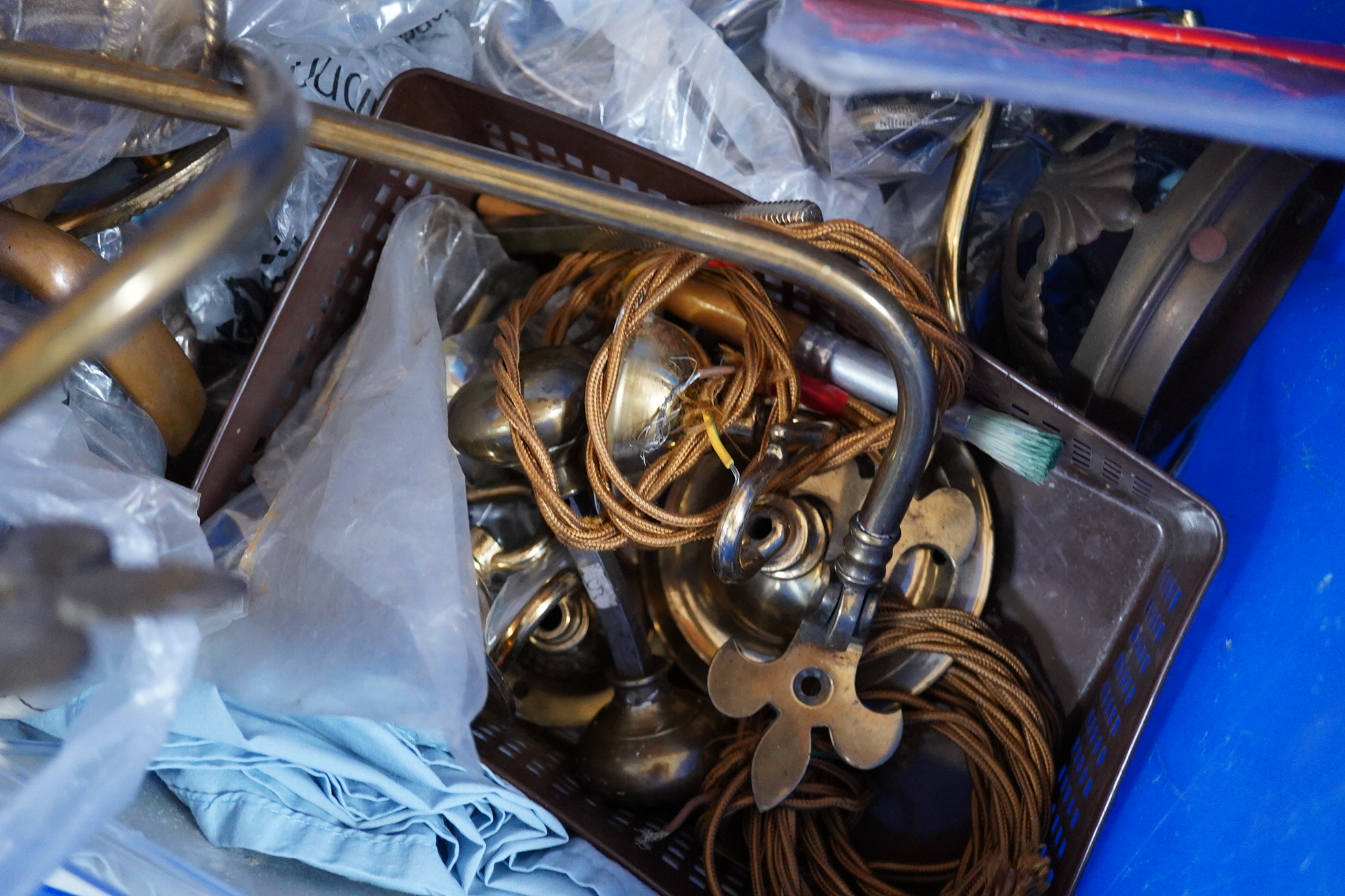 A quantity of various brass door handles